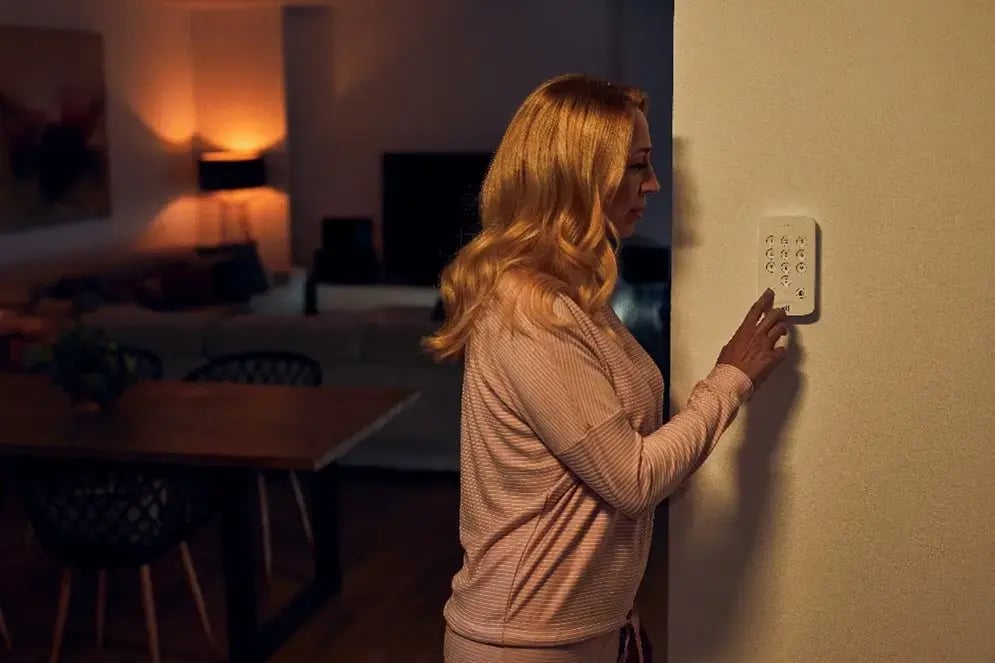 woman arming alarm wpb copy