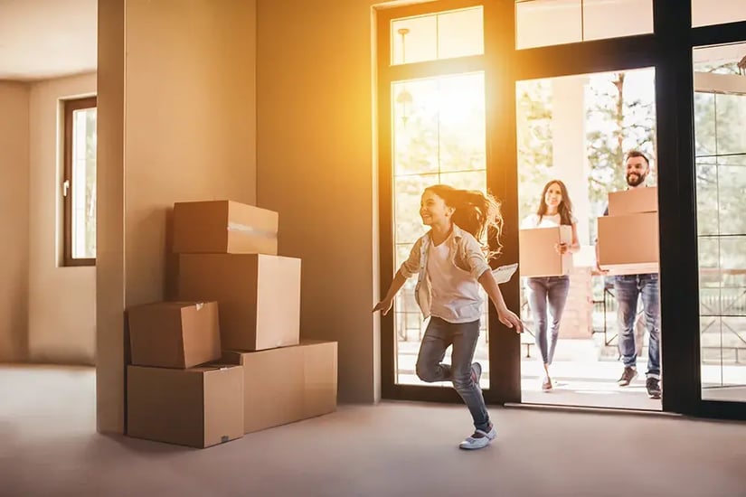 young family moving into new home