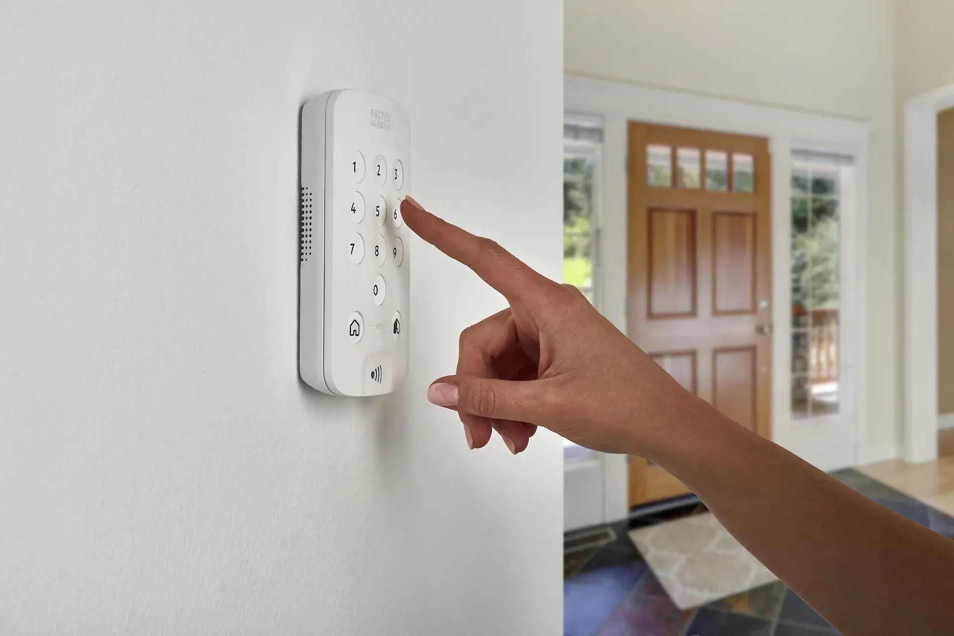 Setting part-arm mode on a PhoneWatch alarm keypad in a hallway for home security while at home
