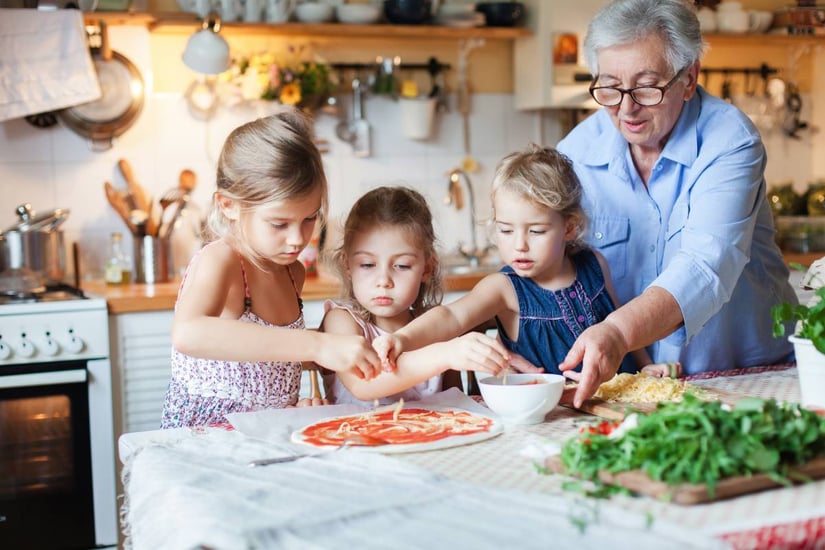 young family at home eating dinner