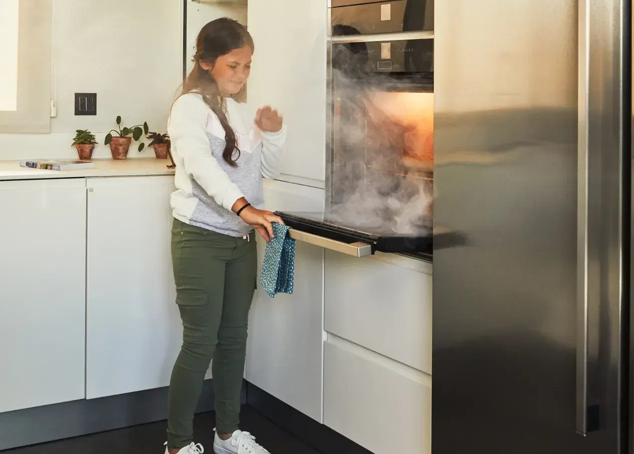 smoke coming out of oven 