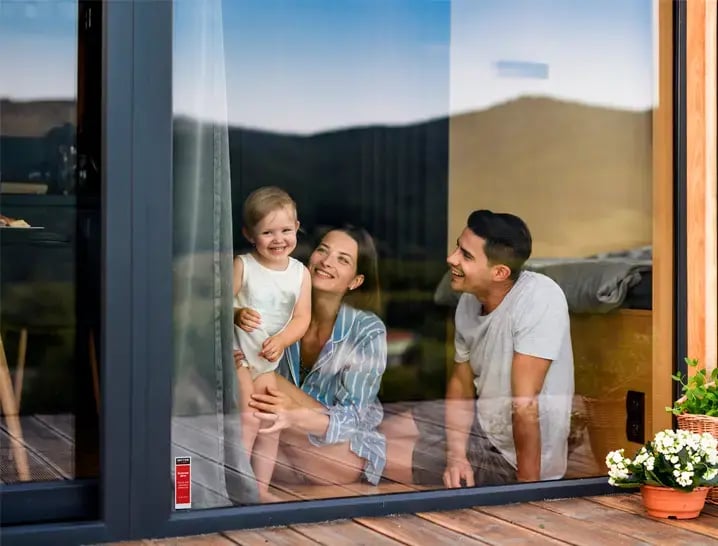 Family at home protected by PhoneWatch monitored smoke and fire detection