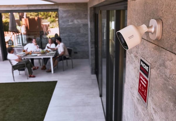 PhoneWatch outdoor security camera monitoring an Irish patio and garden area