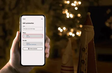 hand holding a smart home app