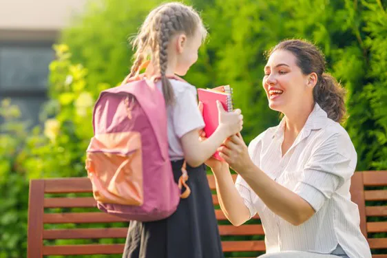 mother and child preparing for school
