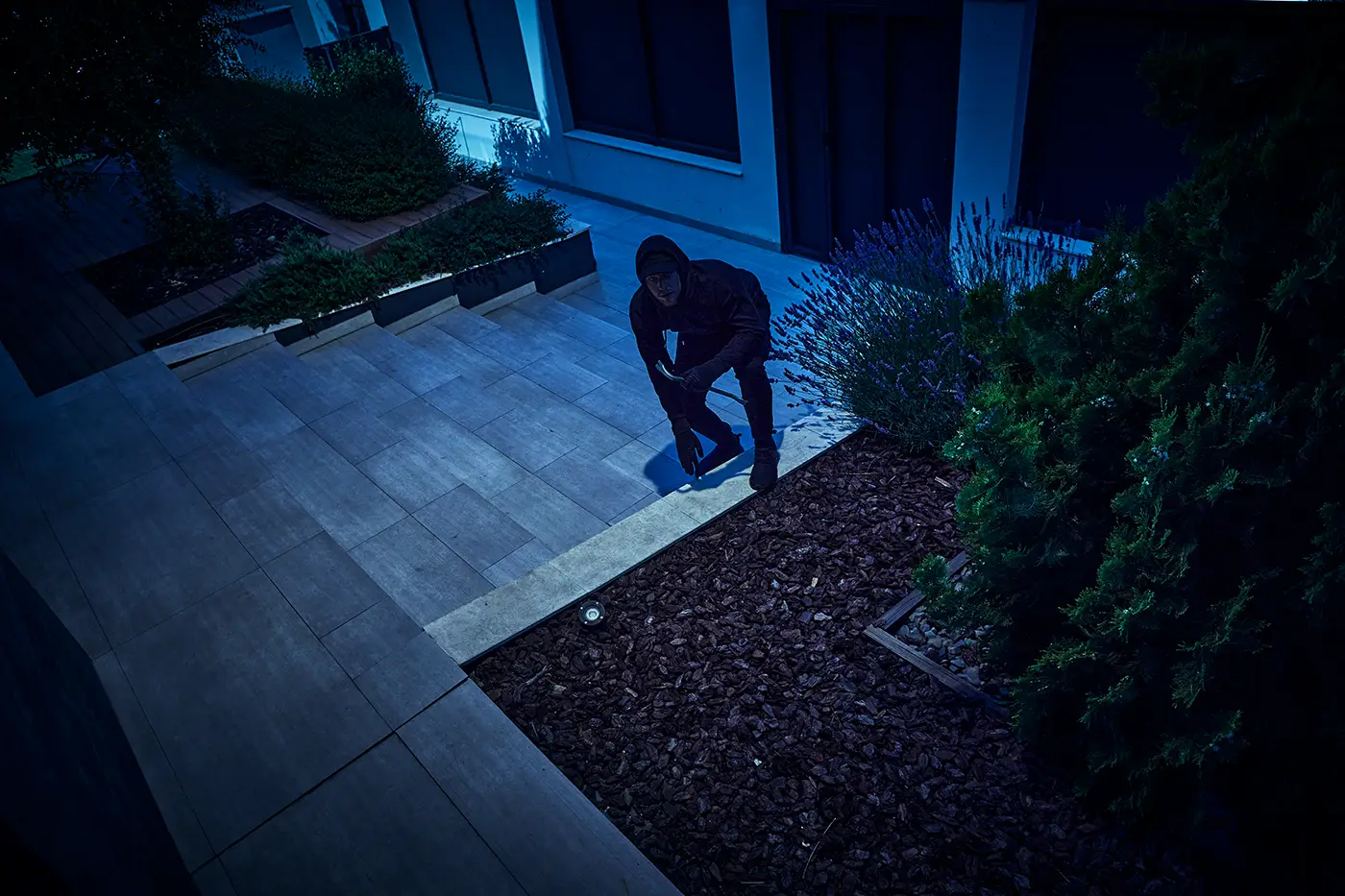 burglar lurking outside home